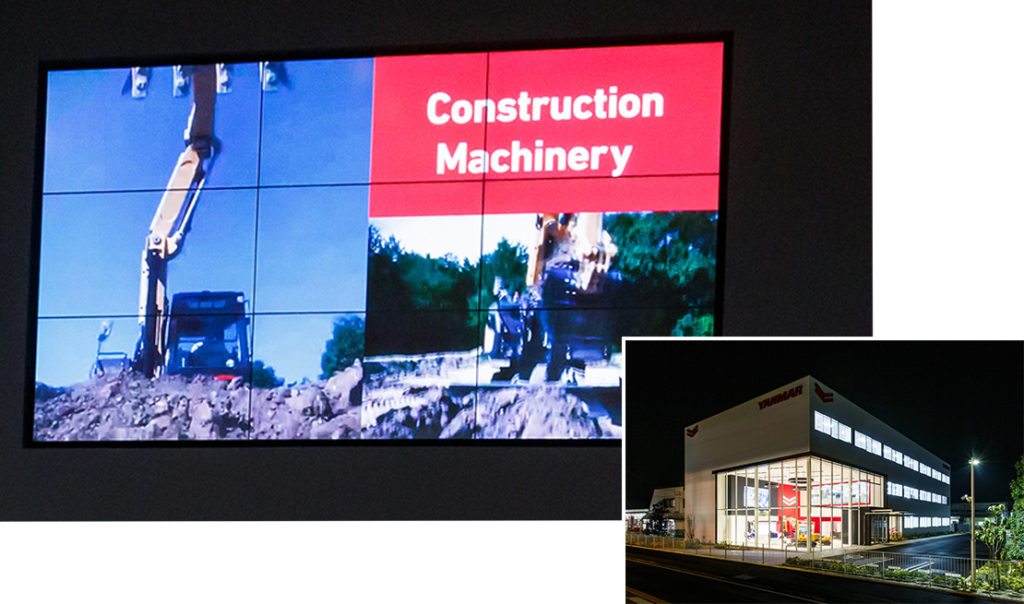 The nine-screen monitor at the front of the showroom plays Yanmar commercials and promotional videos. Even the people passing by the company building can see this grand monitor display.