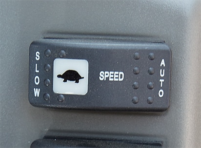 Travel speed mode switch